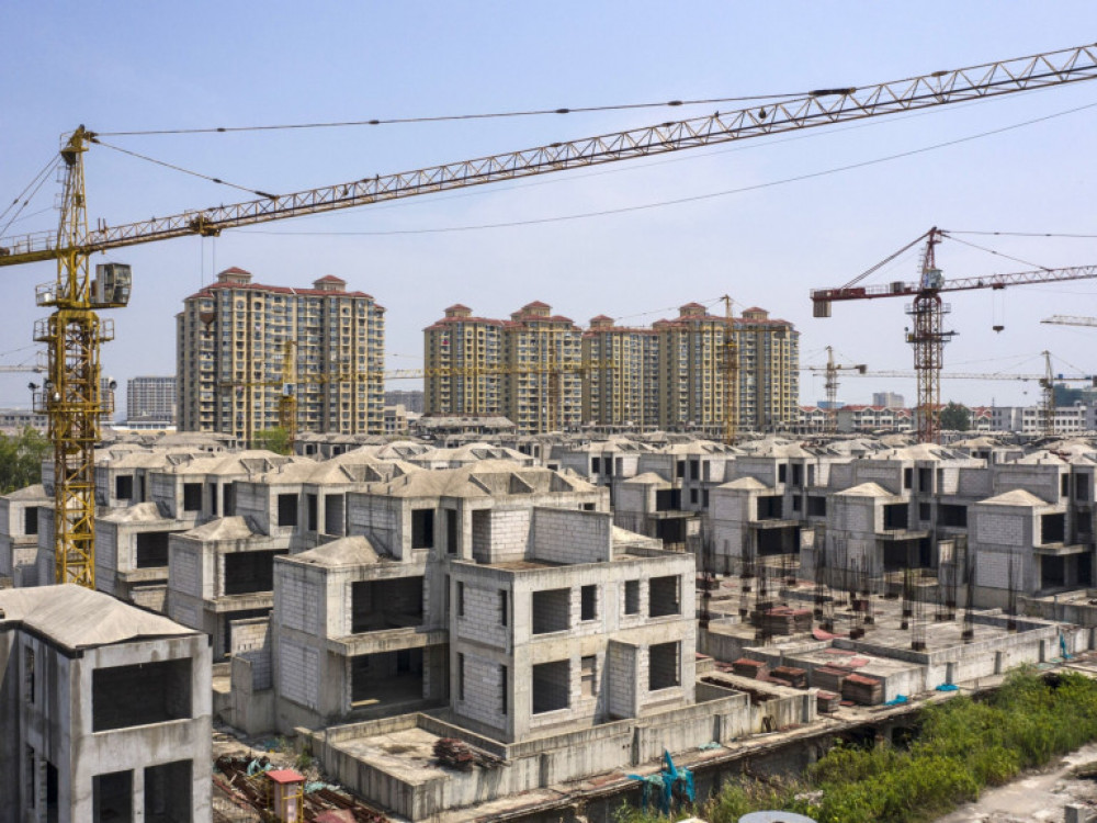 Кина ги олеснува правилата за купување дом